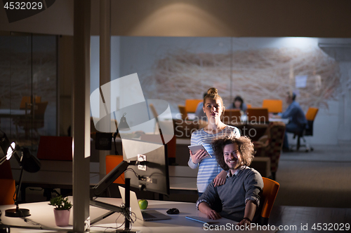 Image of young designers in the night office