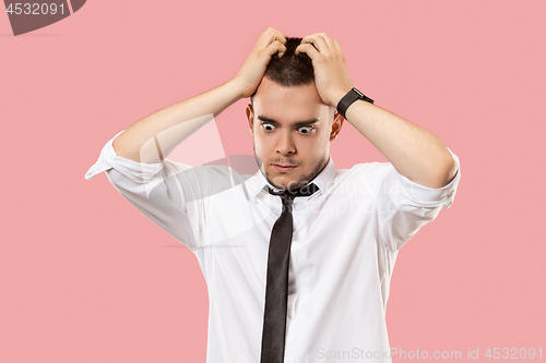 Image of Young emotional surprised, frustrated and bewildered man