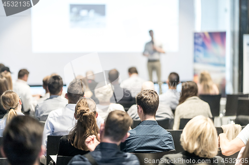 Image of Male business speaker giving a talk at business conference event.