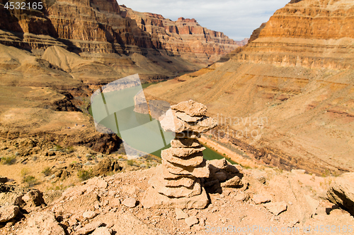 Image of tower of rocks in grand canyon and colorado river