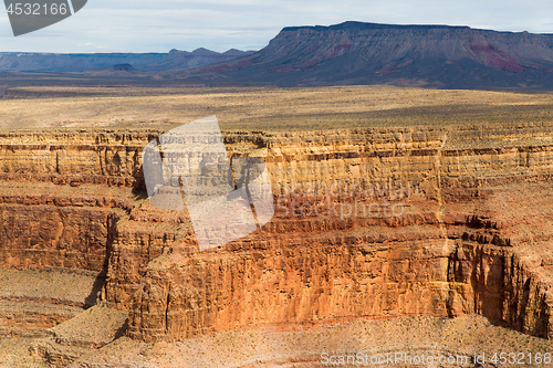 Image of aerial view of grand canyon cliffs from helicopter