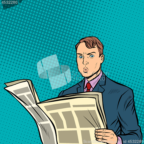 Image of man reading a newspaper