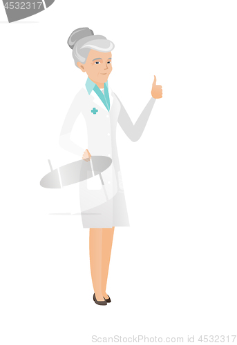 Image of Senior caucasian doctor giving thumb up.