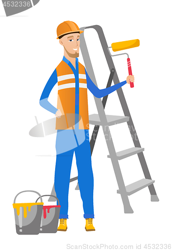 Image of Caucasian house painter holding paint roller.