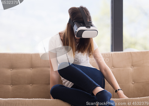 Image of woman using VR-headset glasses of virtual reality