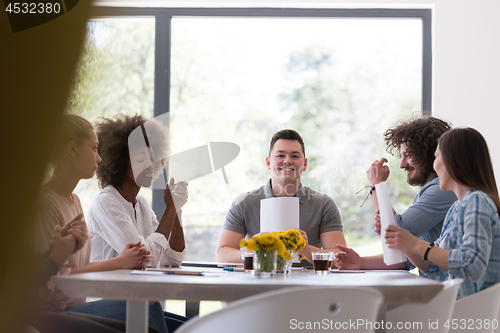 Image of Multiethnic startup business team on meeting