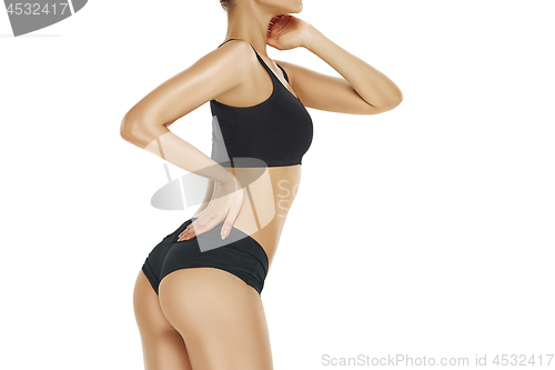 Image of Fit, healthy and sporty girl in swimsuit. Sport, fitness, diet and healthcare concept.
