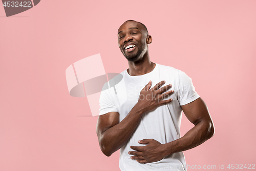 Image of The happy business man standing and smiling