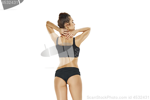 Image of Fit, healthy and sporty girl in swimsuit. Sport, fitness, diet and healthcare concept.