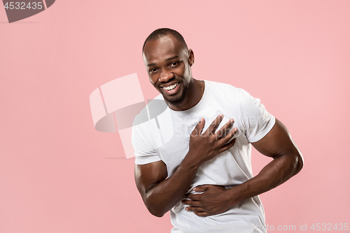 Image of The happy business man standing and smiling