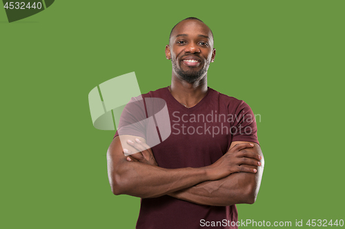 Image of The happy business man standing and smiling