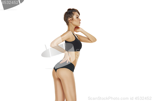 Image of Fit, healthy and sporty girl in swimsuit. Sport, fitness, diet and healthcare concept.