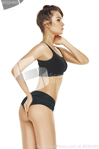 Image of Fit, healthy and sporty girl in swimsuit. Sport, fitness, diet and healthcare concept.