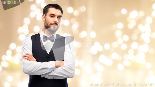 Image of man in party clothes and bowtie