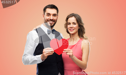 Image of happy couple with red heart on valentines day