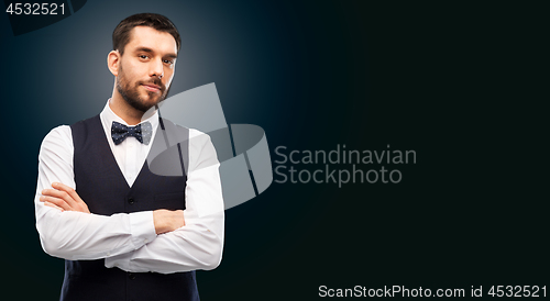 Image of man in party clothes and bowtie