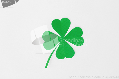 Image of green paper four-leaf clover on white background