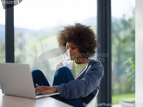 Image of African American woman in the living room