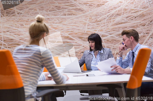 Image of Business Team At A Meeting at modern office building