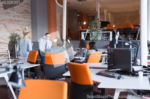 Image of Young Business Team At A Meeting at modern office building