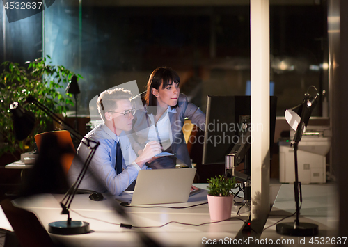 Image of young designers in the night office