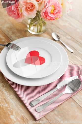 Image of close up of table setting for valentines day