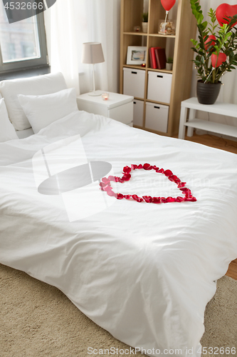 Image of cozy bedroom decorated for valentines day