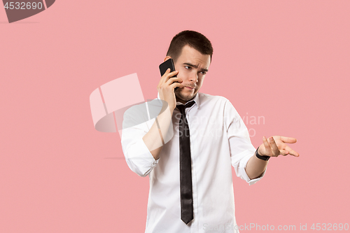 Image of Handsome businessman with mobile phone