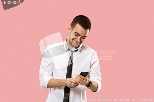 Image of Handsome businessman with mobile phone