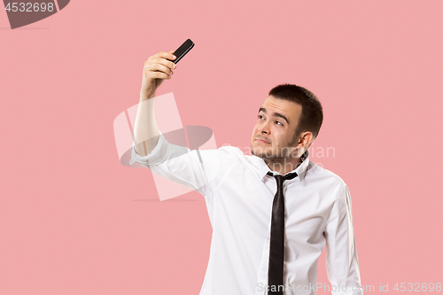 Image of Handsome businessman with mobile phone
