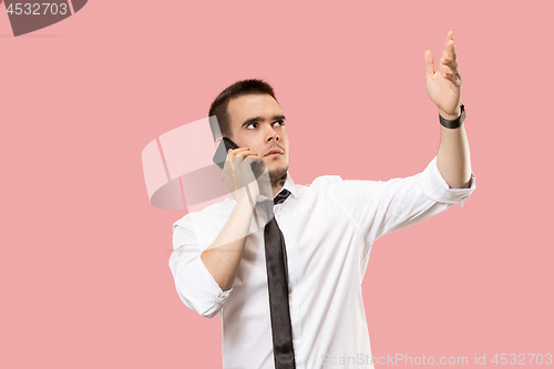 Image of Handsome businessman with mobile phone