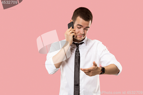 Image of Handsome businessman with mobile phone