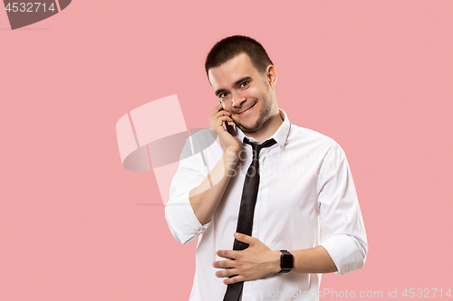 Image of Handsome businessman with mobile phone
