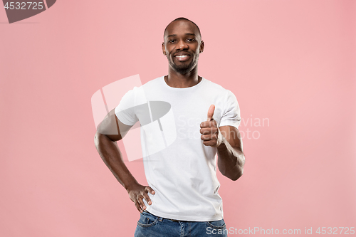 Image of The happy businessman standing and smiling