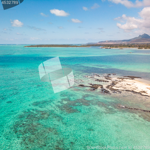 Image of Aerial view of beautiful tropical beach with turquoise sea. Tropical vacation paradise destination of D\'eau Douce and Ile aux Cerfs Mauritius