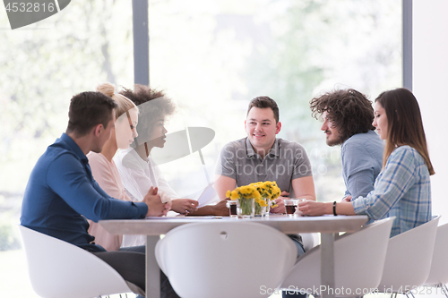 Image of Multiethnic startup business team on meeting