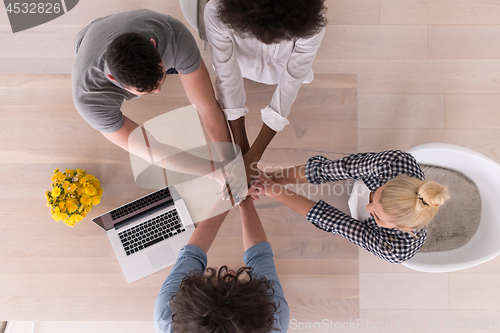 Image of top view of Multiethnic startup business team on meeting