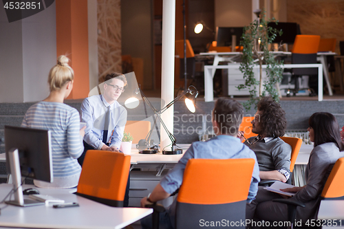 Image of Young Business Team At A Meeting at modern office building