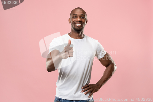 Image of The happy businessman standing and smiling