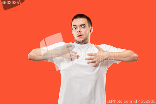 Image of The young attractive man looking suprised