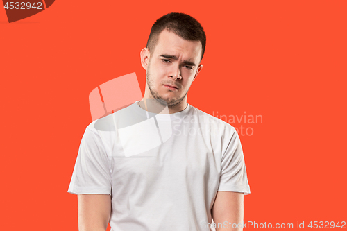 Image of Young emotional surprised, frustrated and bewildered man