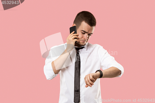 Image of Handsome businessman with mobile phone