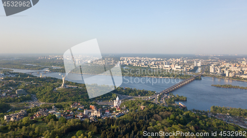 Image of Aerial view panoramic view of the city of Kiev part of the Botanical Garden and the Dnieper River. Photo from the drone