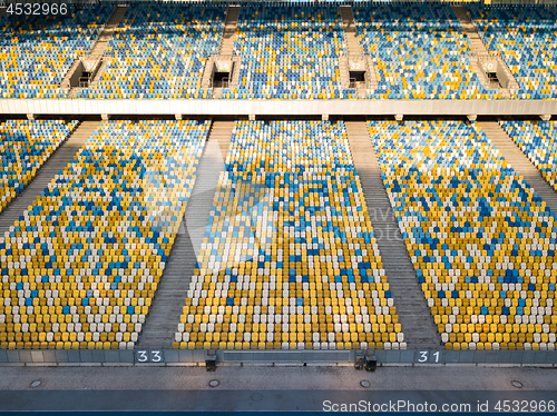 Image of KYIV, UKRAINE - July 19, 2018. Empty tribunes of NSC Olimpiysky before the soccer game.