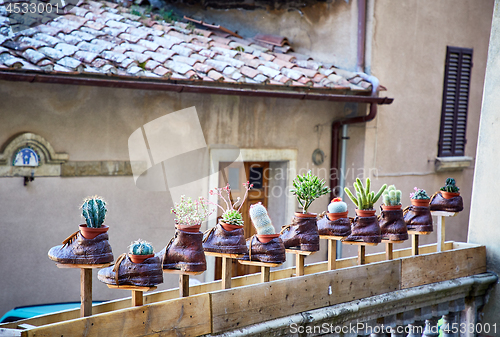 Image of shoe store advertising on street of Montepulciano 