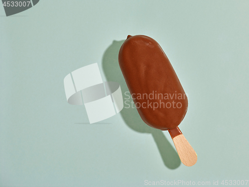 Image of ice cream on pastel green background