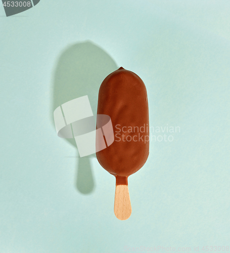 Image of ice cream on pastel blue background