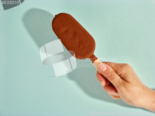 Image of ice cream covered with chocolate