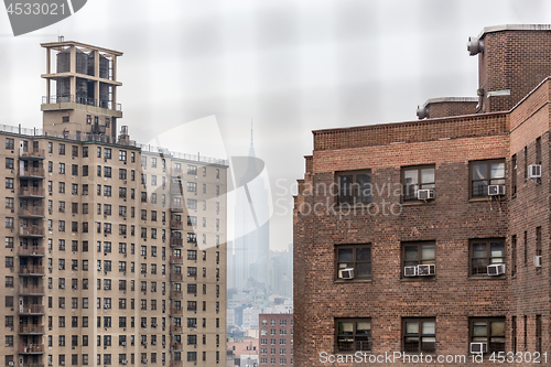 Image of New York Chinatown district and lower manhattan offices on the becakground