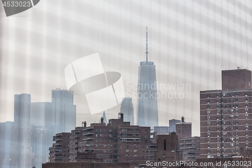 Image of New York Chinatown district and lower manhattan offices on the becakground